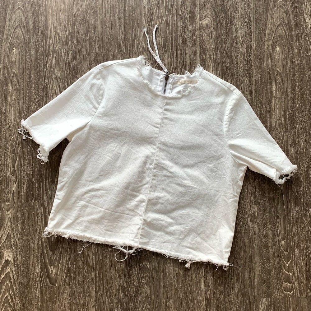 Rachel Roy raw hem back zipper white shirt.Medium